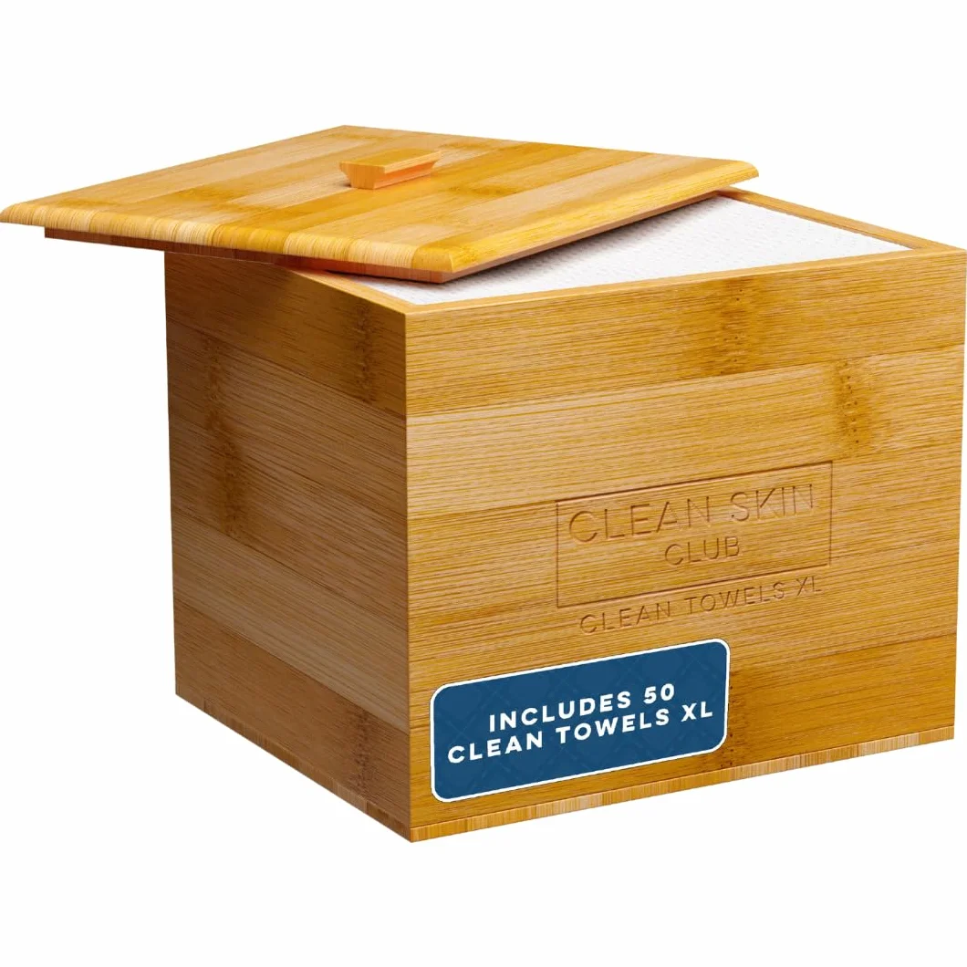 Clean Skin Club Contenedor de bambú de lujo con funda, incluye 50 toallas faciales desechables Clean Towels XL Original